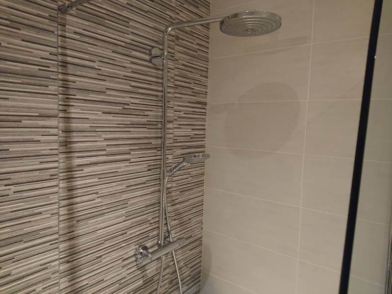 Installation d'une robinetterie de douche thermostatique à Montmorency proche Franconville 95