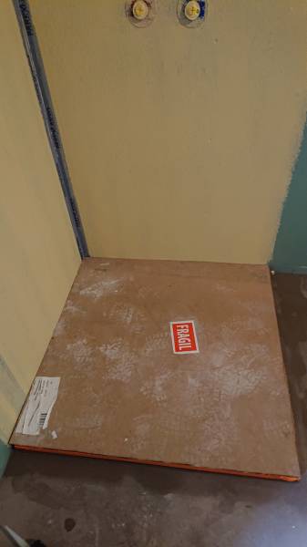 Pose étanchéité à l'eau sous faïence dans une douche, Nesles-la-Vallée 95690