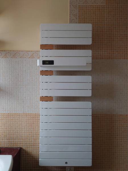 Remplacement d’un radiateur sèche serviette connecté et programmable dans une maison à Le Plessis Bouchard 95130